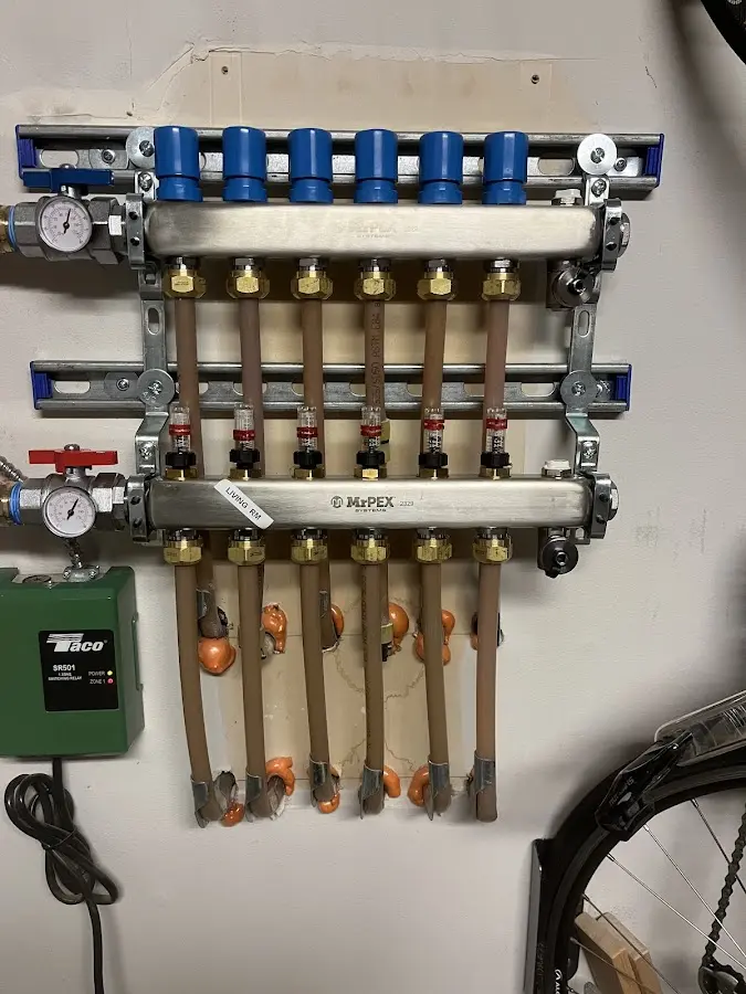 Plumber performing Gas Line Installation at a residential property in Esopus